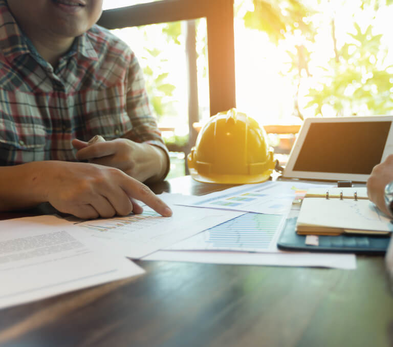 Contractor running numbers with a client